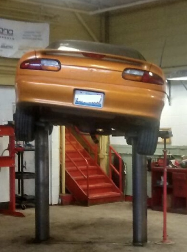 Vehicle Lift Service: Chicago | PR Streich and Sons - car_on_hoist